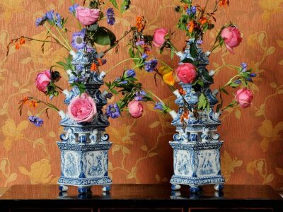 Display Of Antique Dutch Delftware Pottery In Ceramic Flower Vases