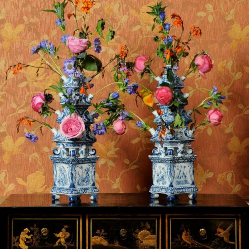 Display Of Antique Dutch Delftware Pottery In Ceramic Flower Vases