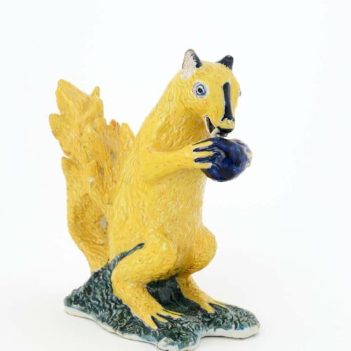Antique Delft pottery polychrome figurine of a squirrel