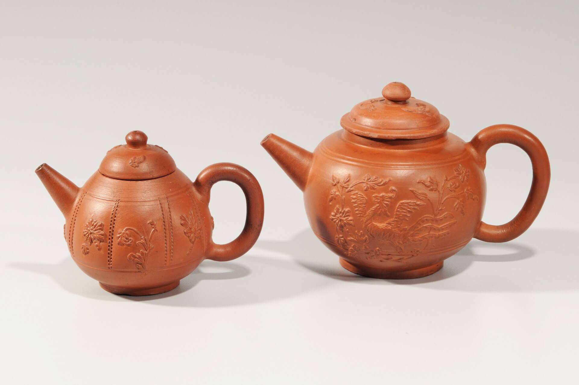 Antique ceramic red stoneware teapots