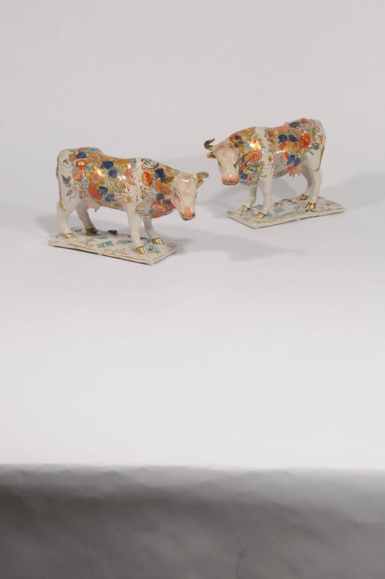 petit fue pair of gilt figure cows antique pottery