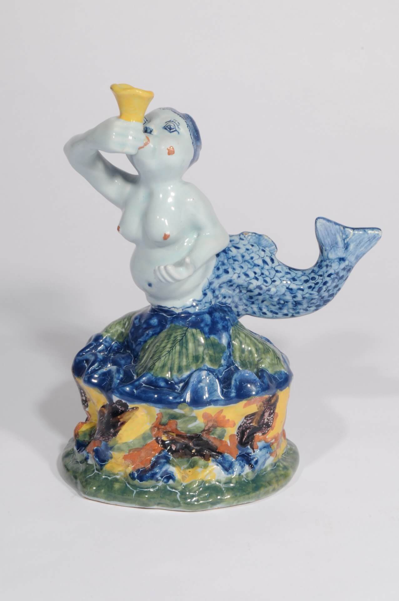 Polychrome figurine of mermaid