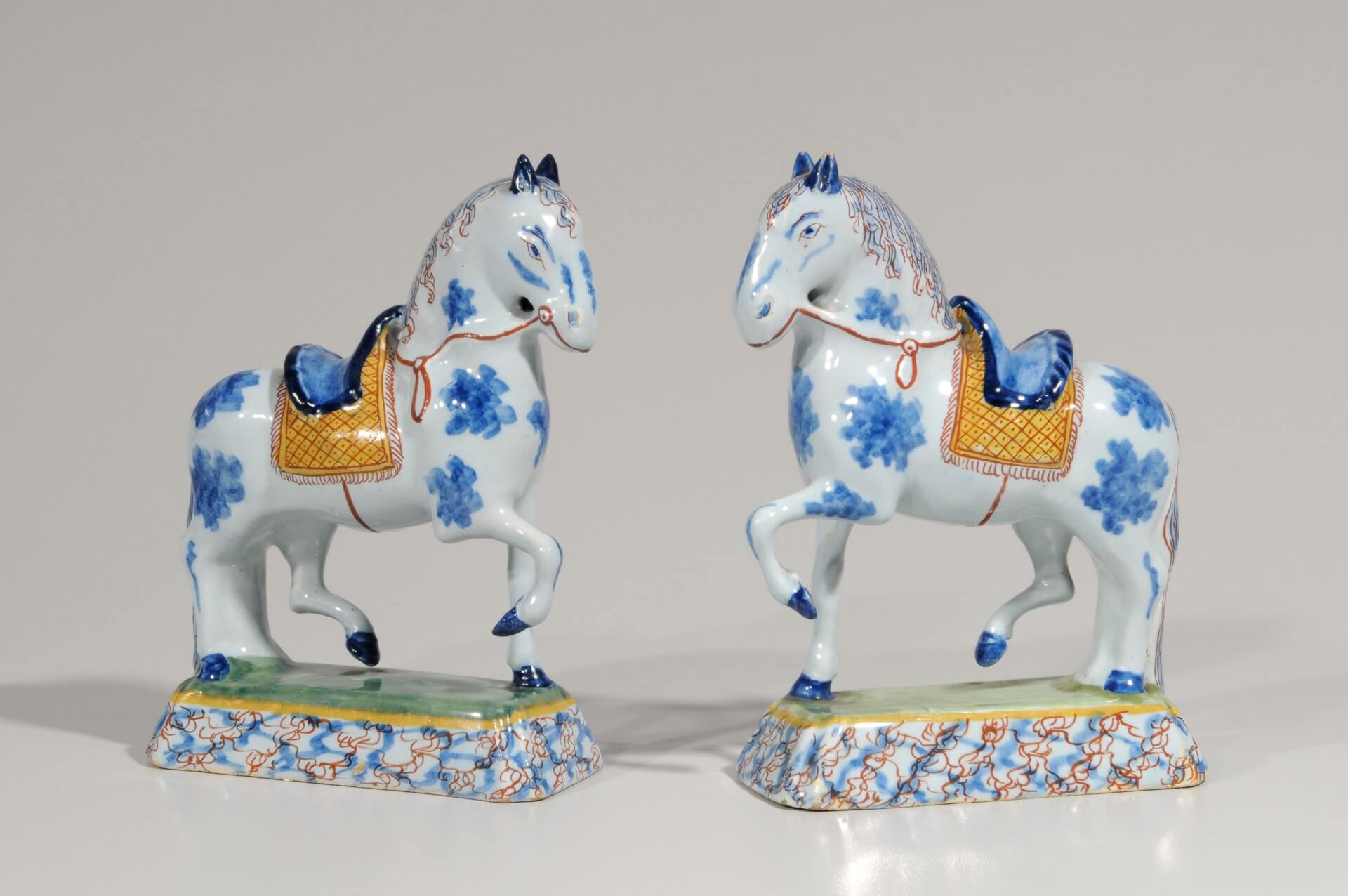 Antique delft figures of horses