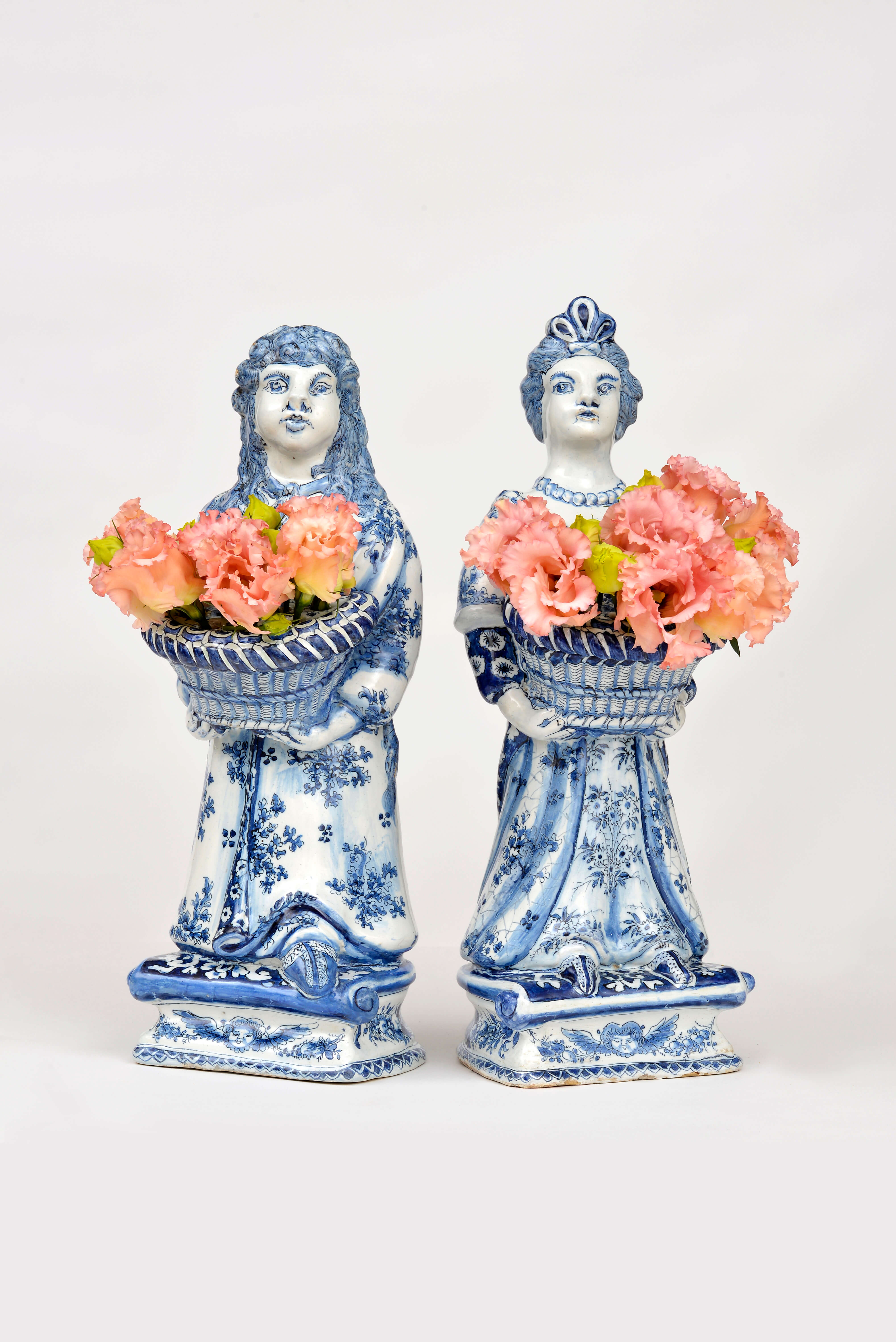 Pair of unique Dutch Delftware bouquetière figures of William & Mary