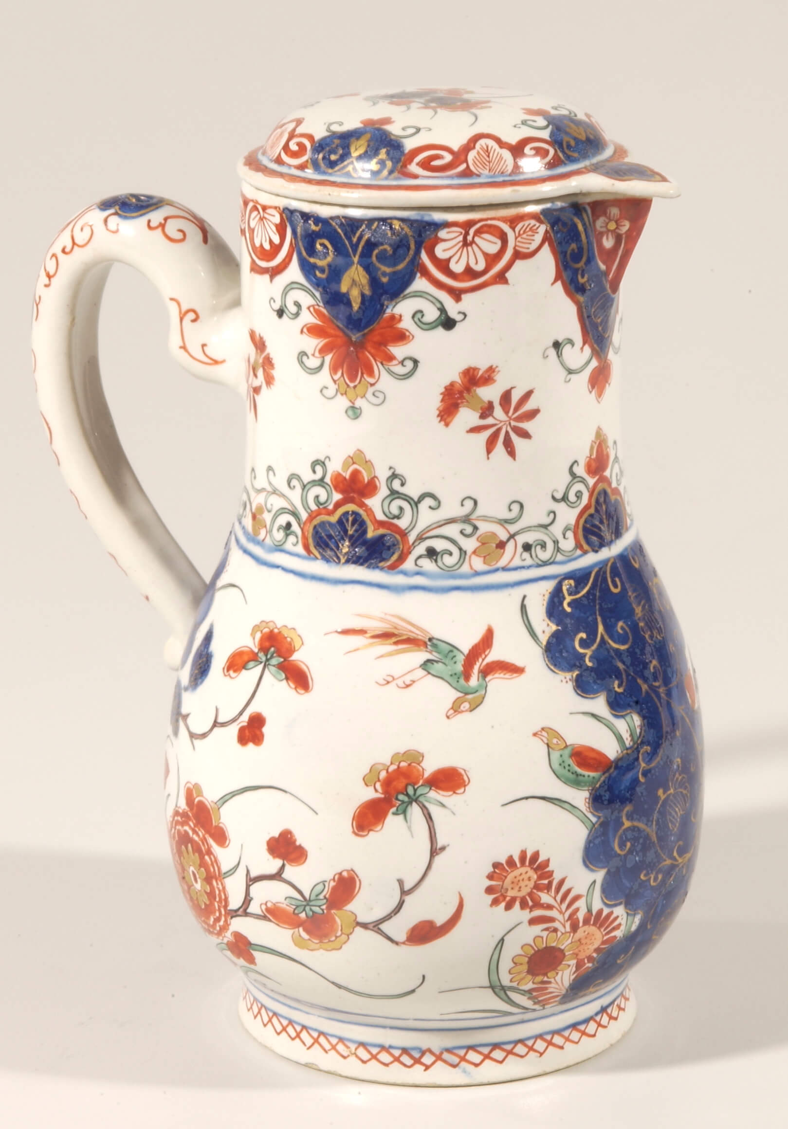 Antique polychrome jug with cover