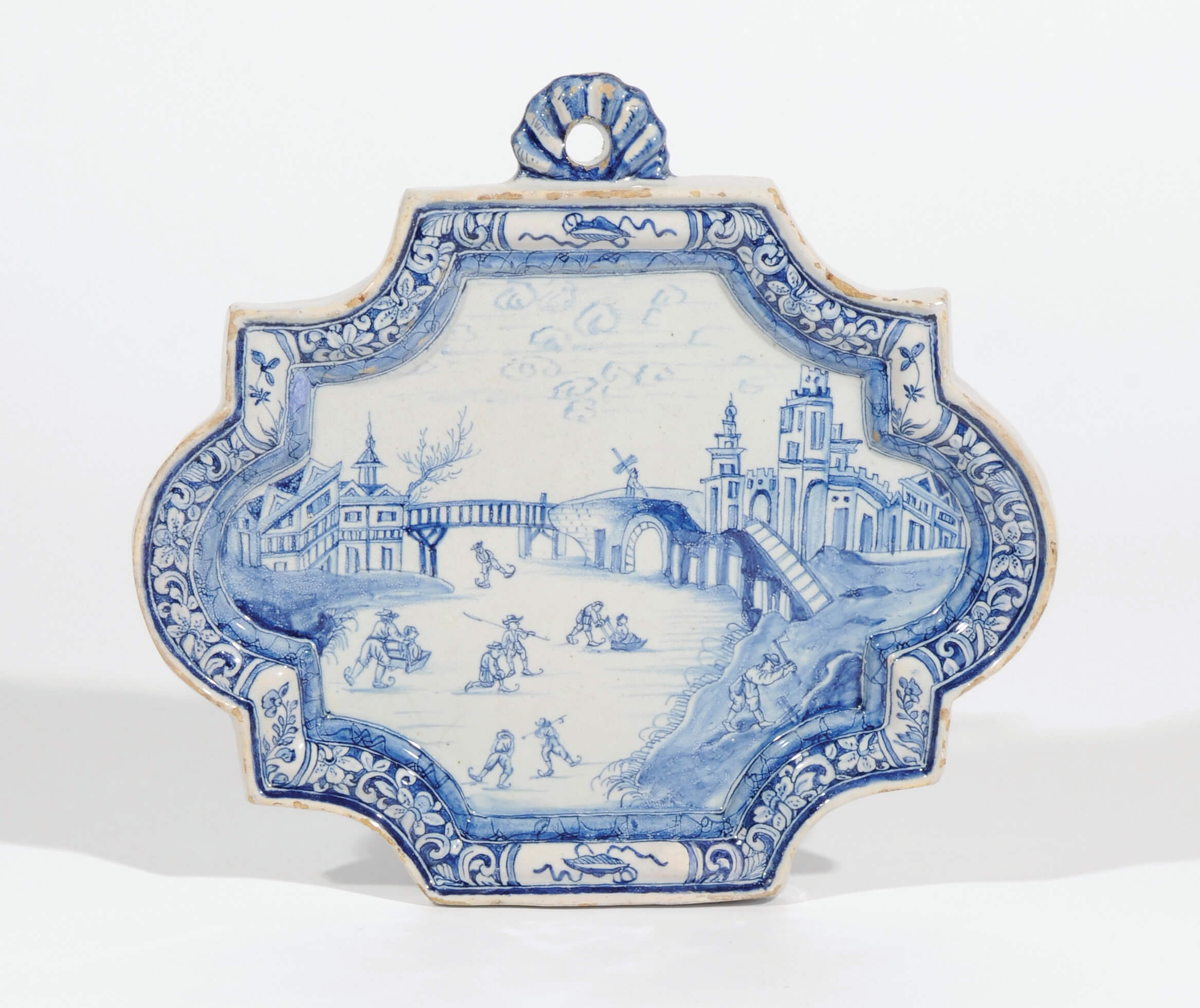 Antique plaque displaying a scene of Dutch winter on Dutch Delftware