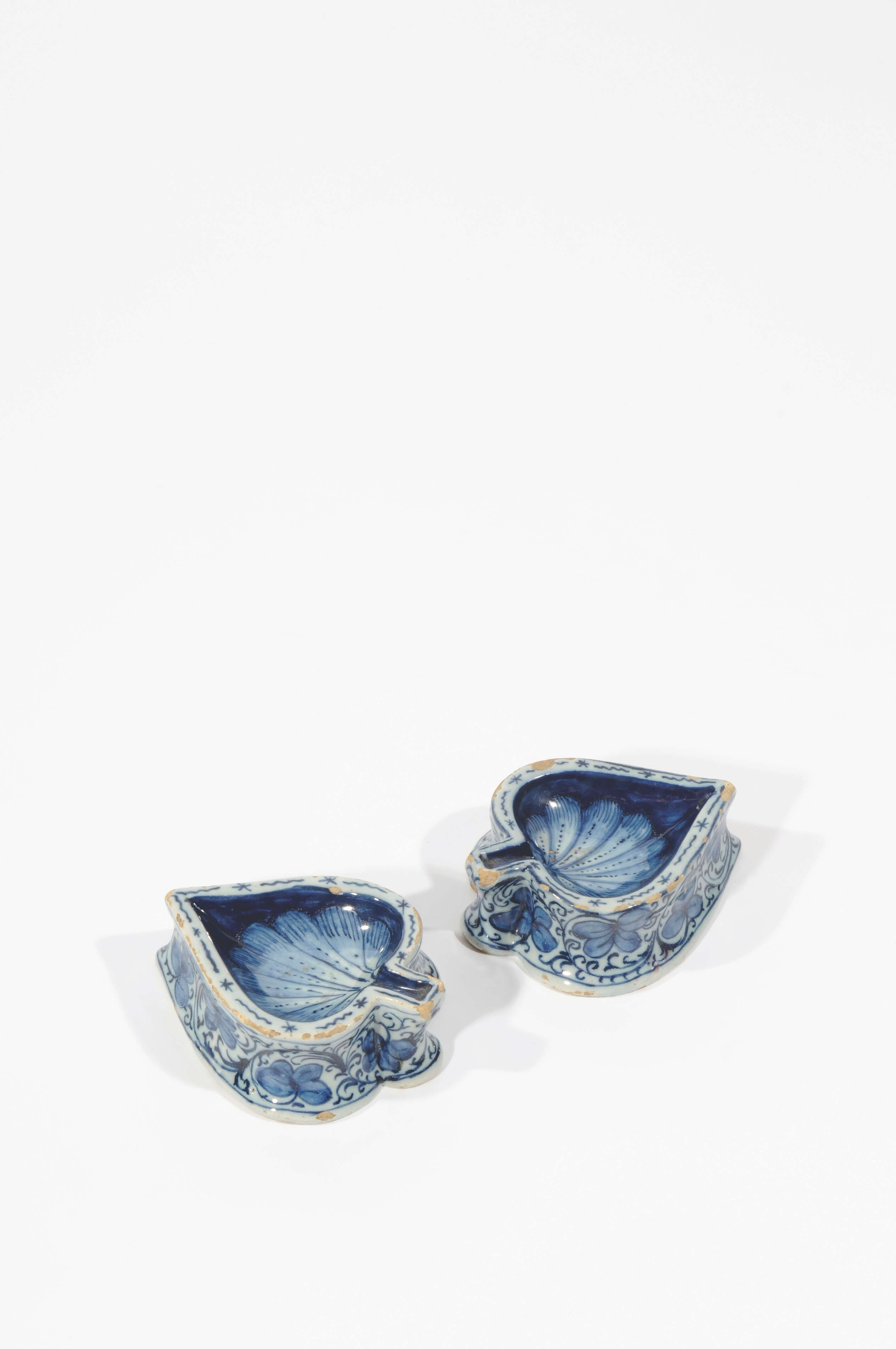 Antique Delftware pottery blue and white leaf shaped salt cellars