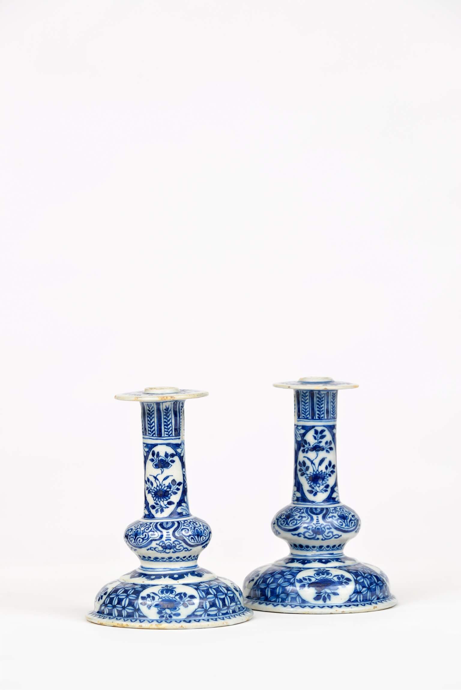 •D1422. Pair of Blue and White Silver-Shape Candlesticks