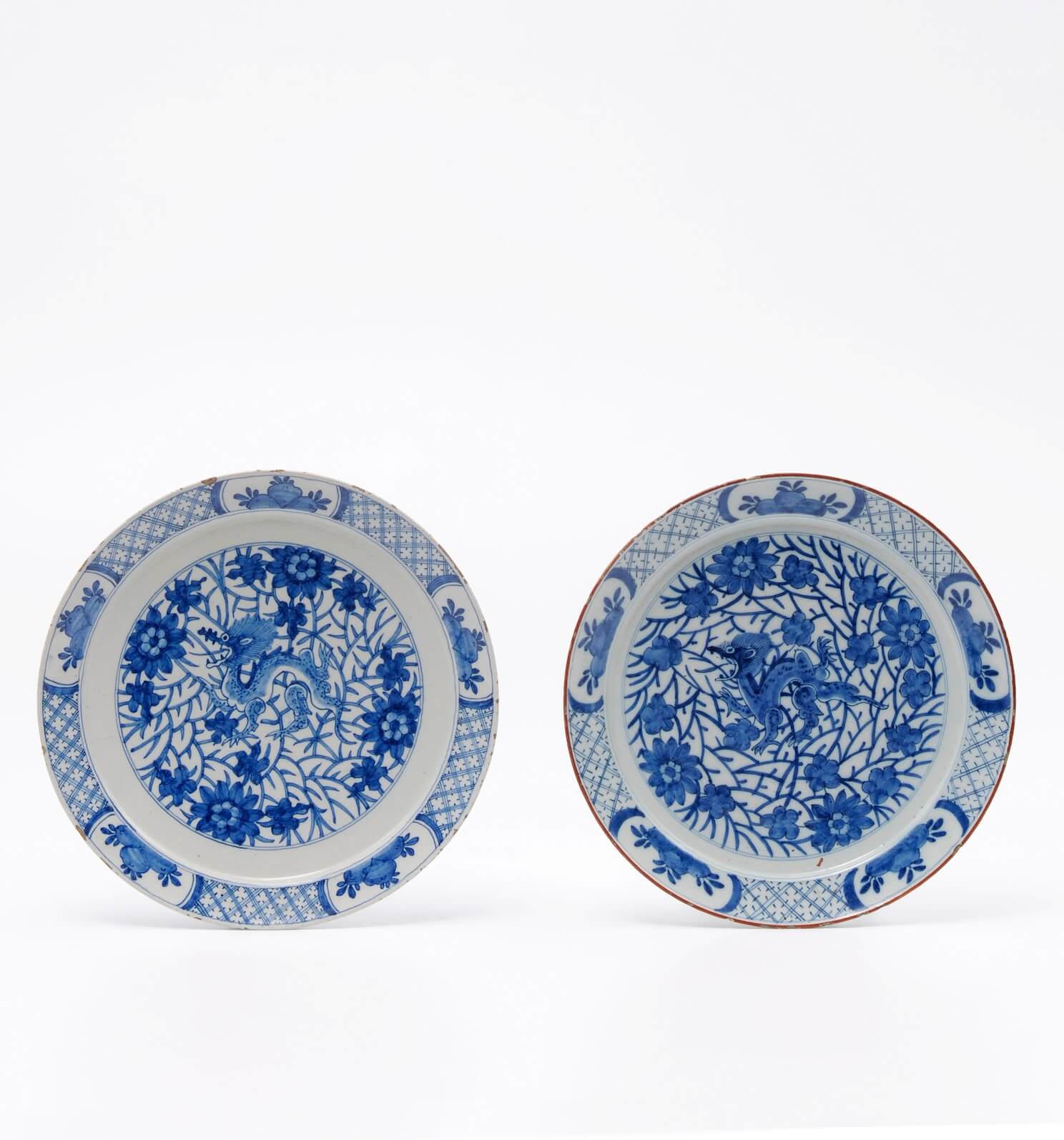 Antique dragon pattern plates delftware at Aronson Antiquairs