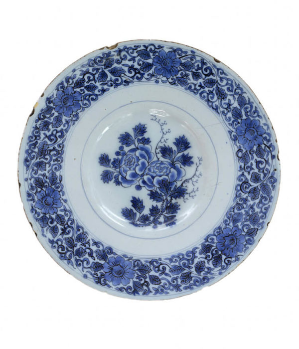 delftware blue and white plate with roses