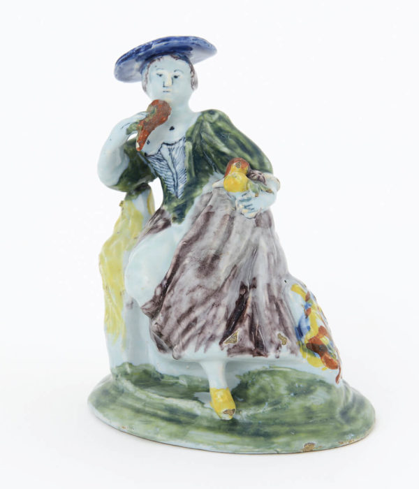 ceramic polychrome figure of a seated lady