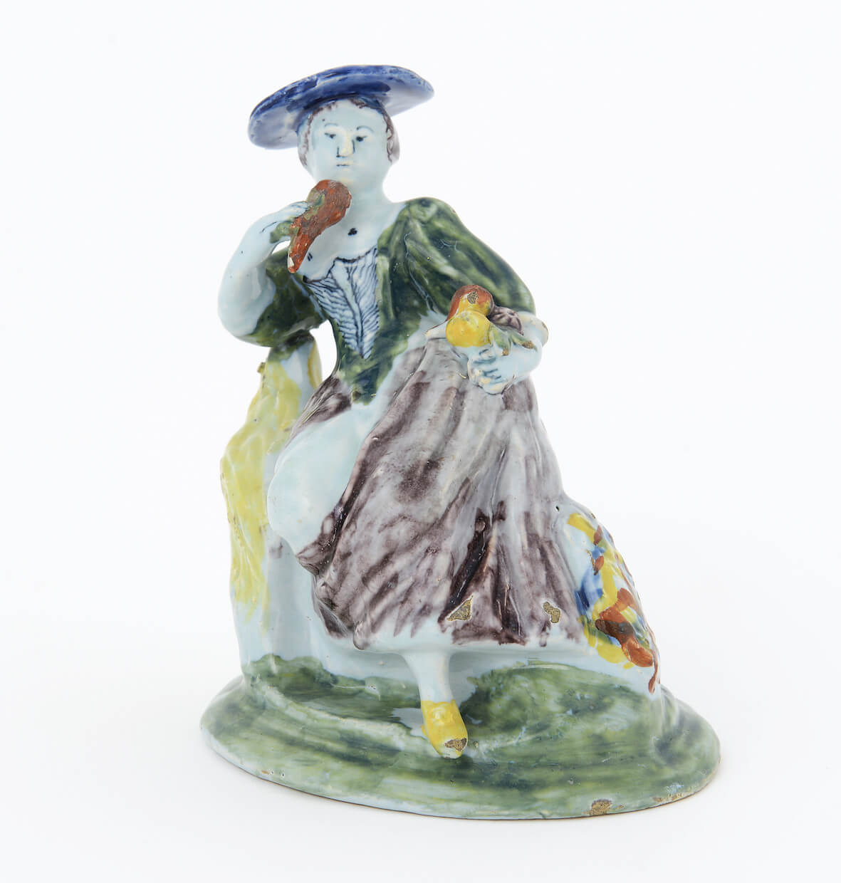 ceramic polychrome figure of a seated lady