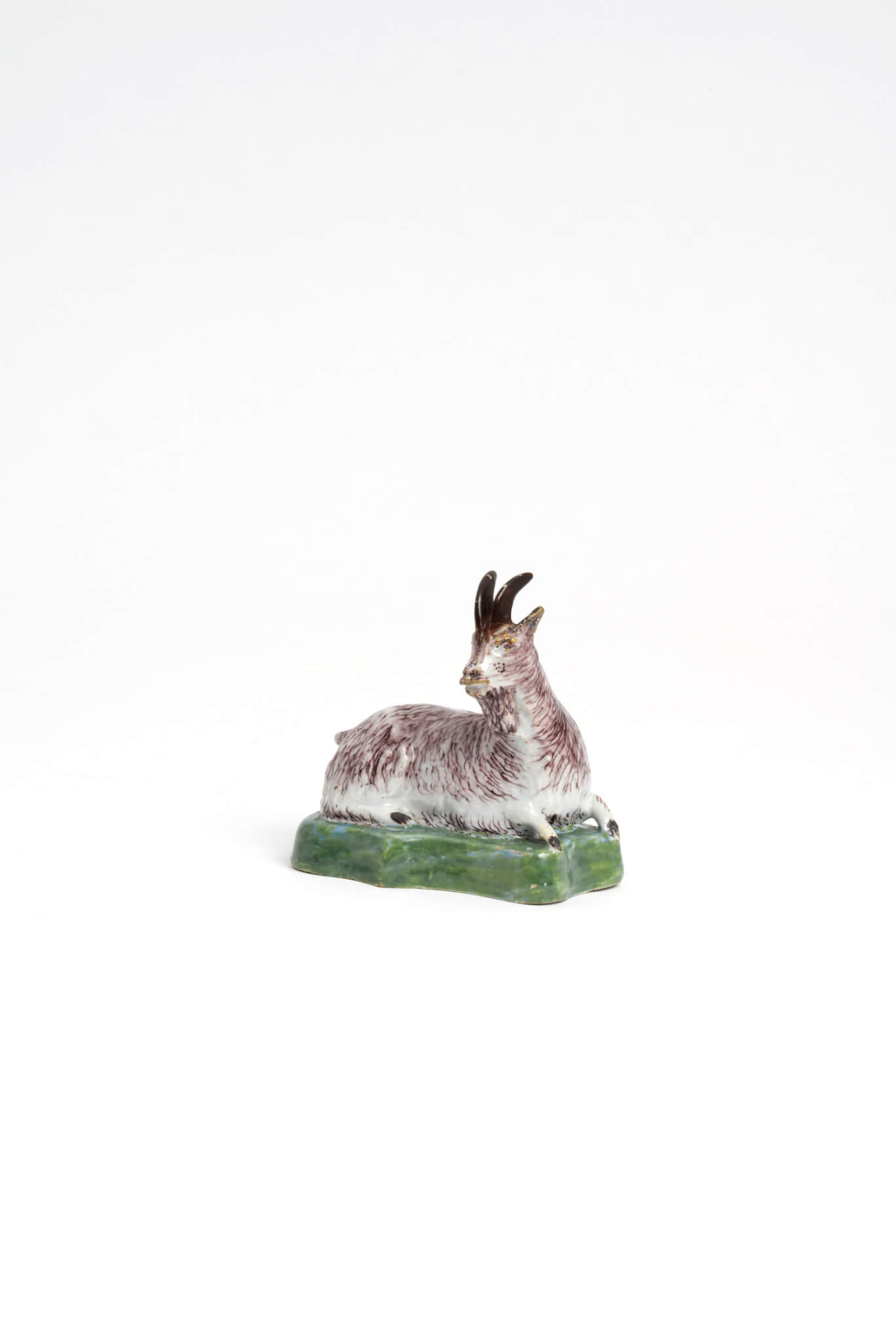 polychrome antique recumbent goat