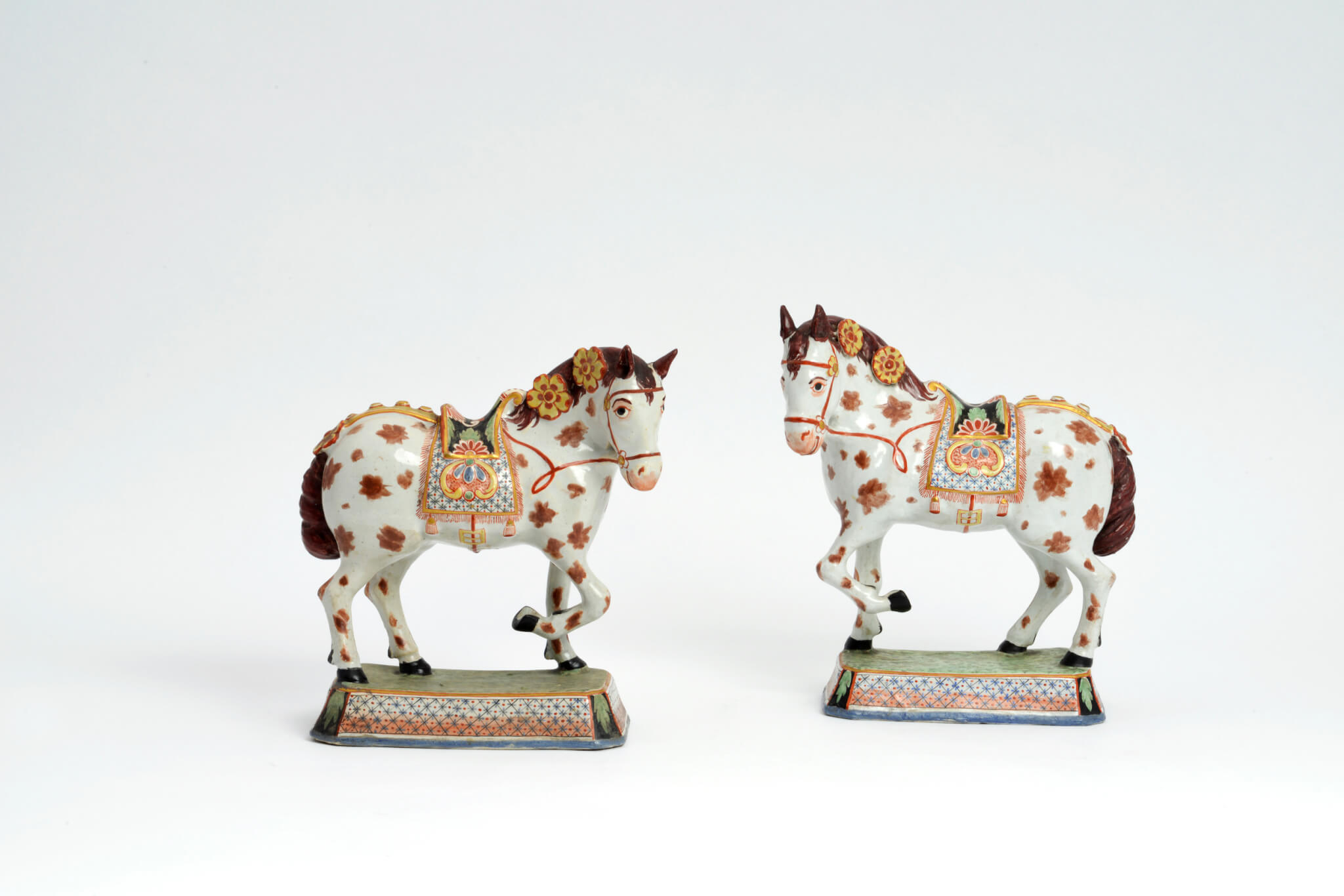 pair of polychrome petit fue horses