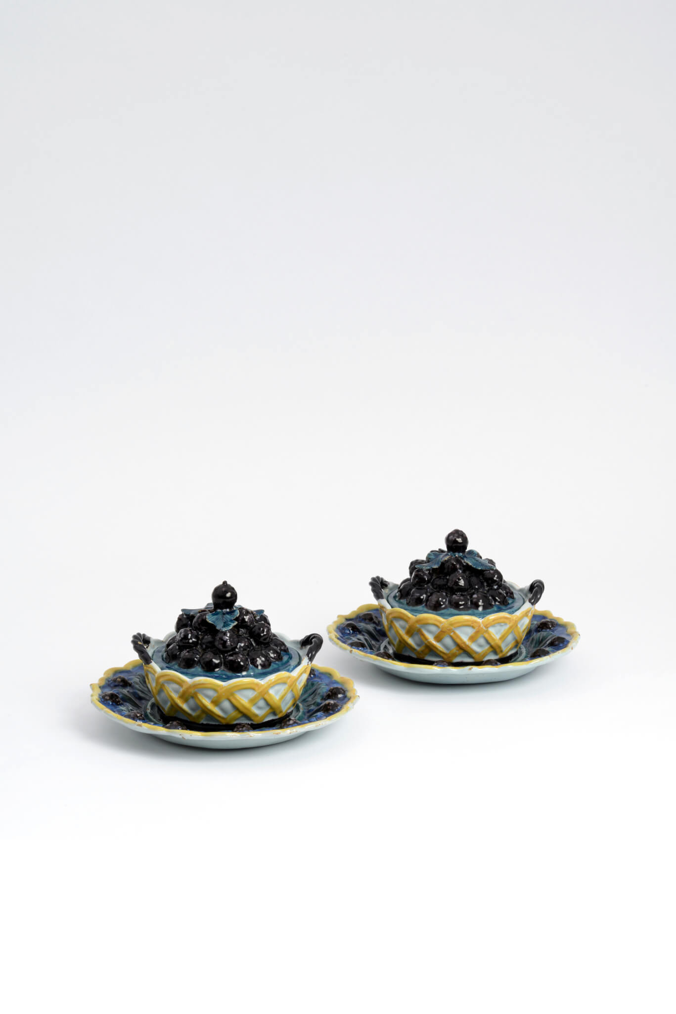 • D1870. Pair of Polychrome Blackberry Tureens, Covers and Stands