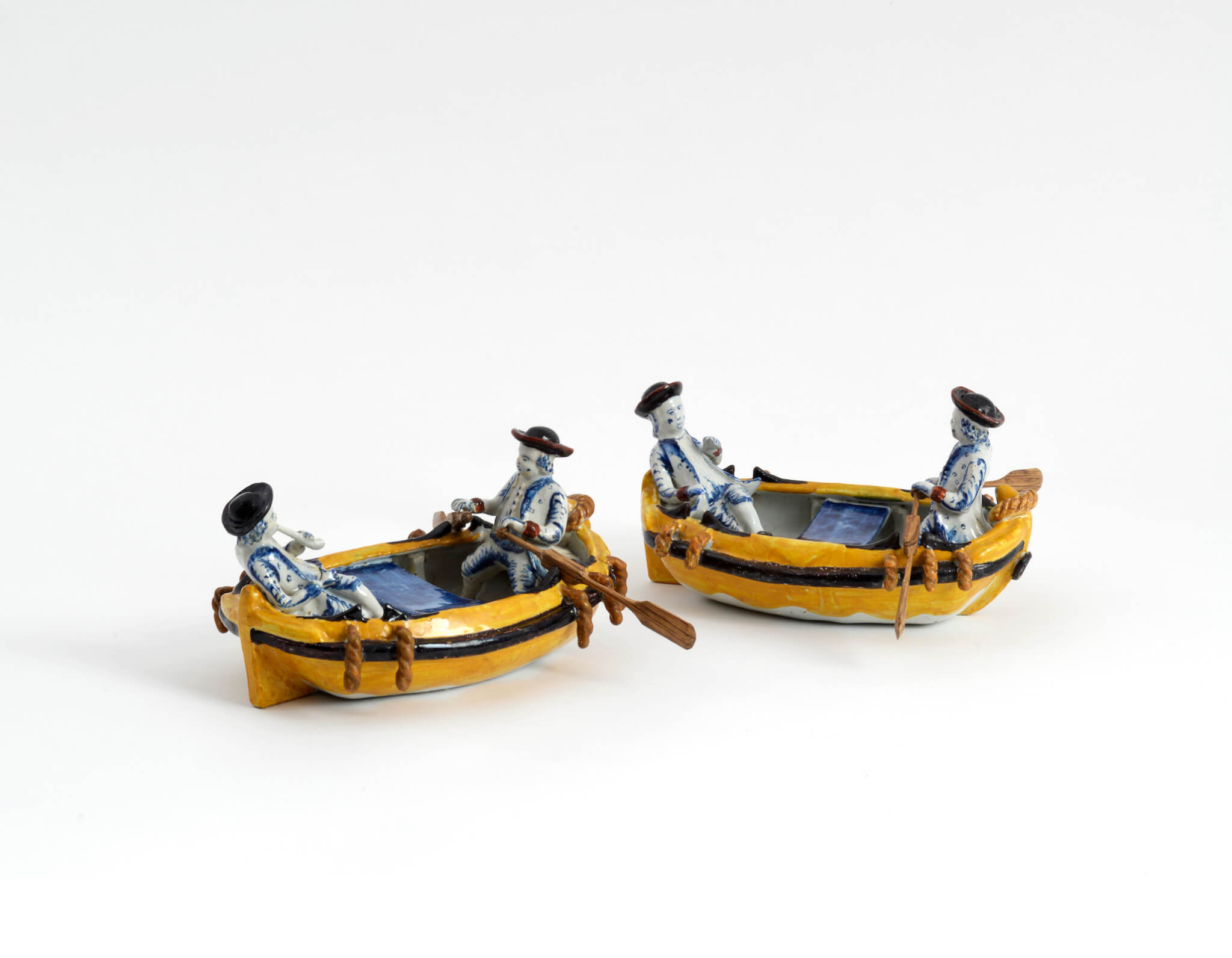polychrome group of gentleman rowing