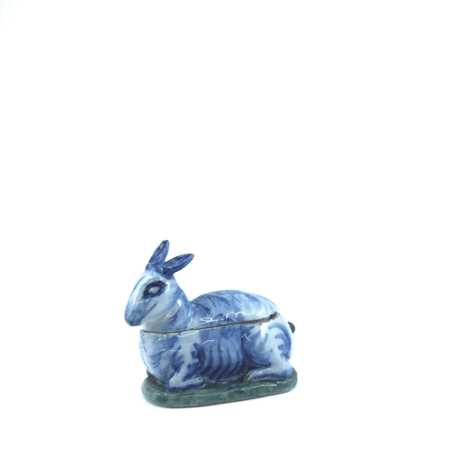 3d view antique polychrome hare crouching