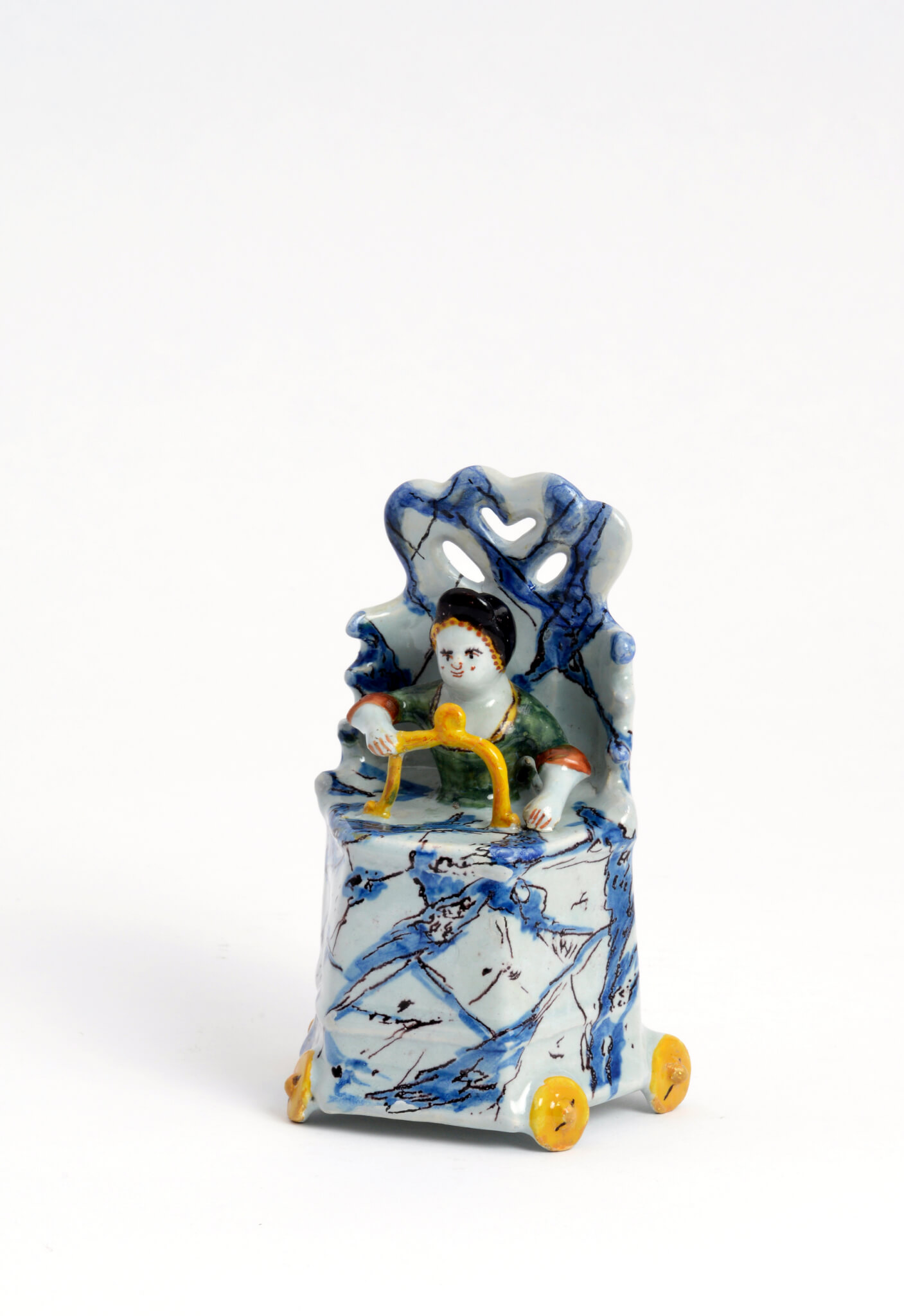 child in high chair antique delftware ceramic