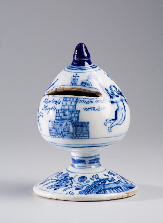 antique delftware money bank