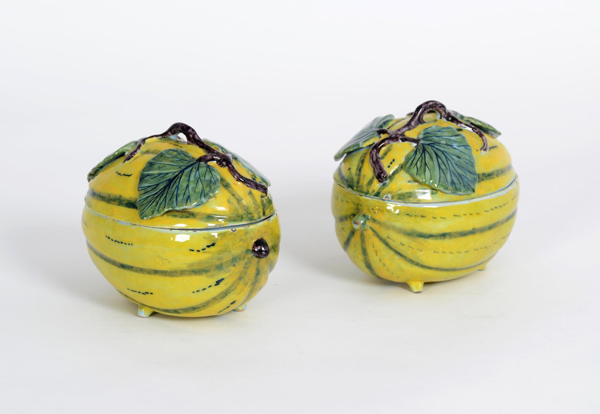 Pair of Polychrome Melon Tureens and Covers