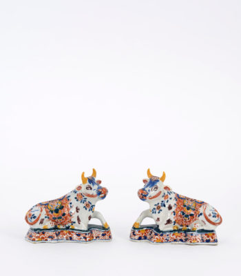 D1960. Pair Of Polychrome Models Of Recumbent Cows