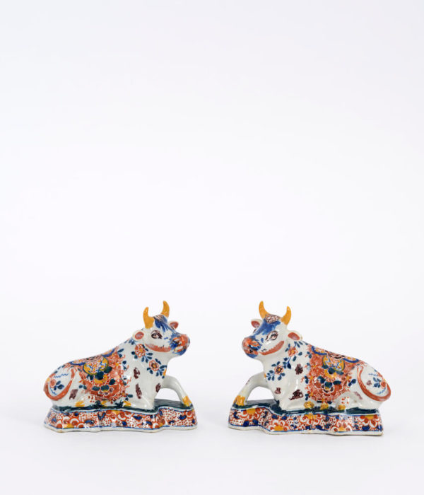 D1960. Pair of Polychrome Models of Recumbent Cows