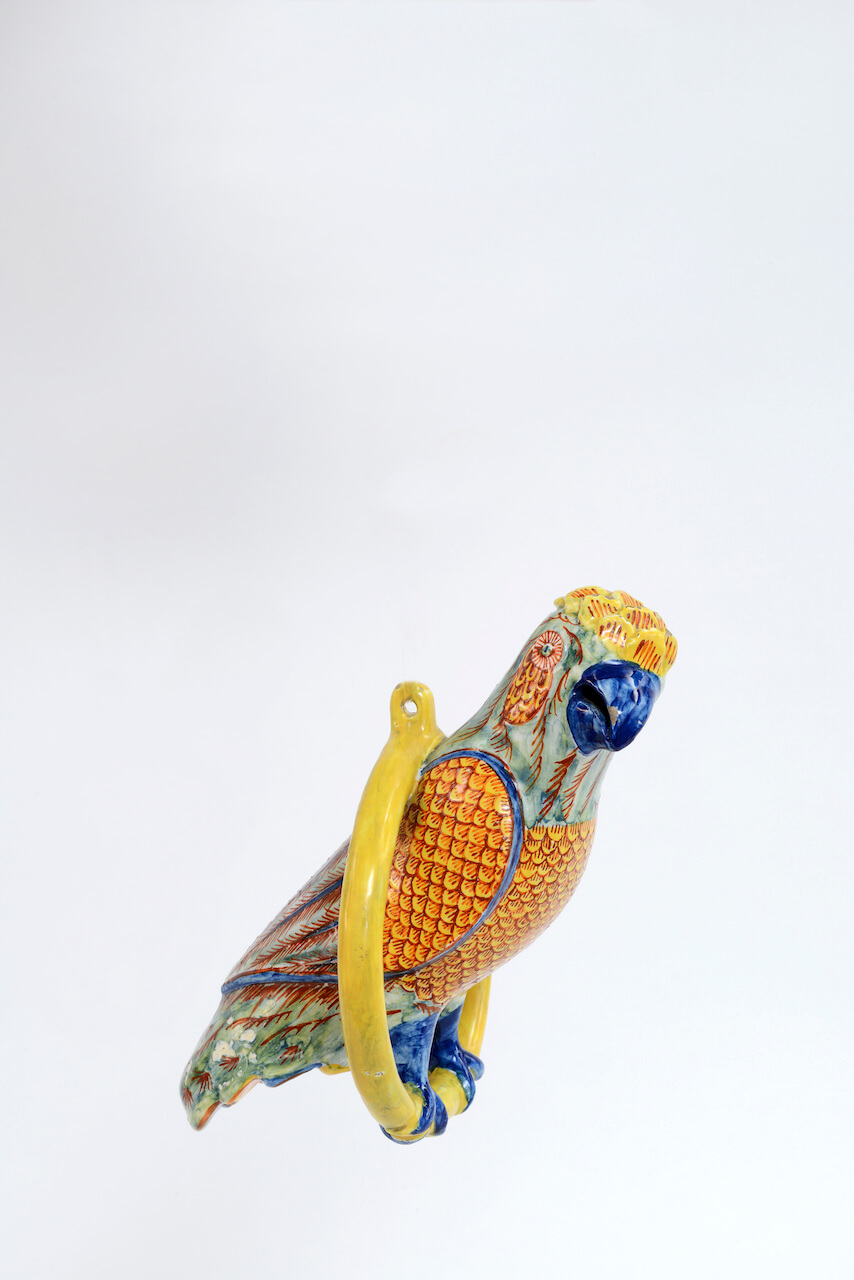 1968. Polychrome Figure of a Parrot on a Ring