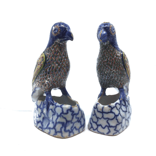 Pair of polychrome models of parrots