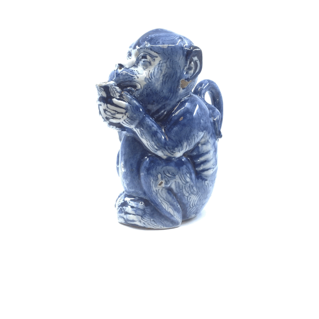 Blue and white jug in the form of a seated monkey