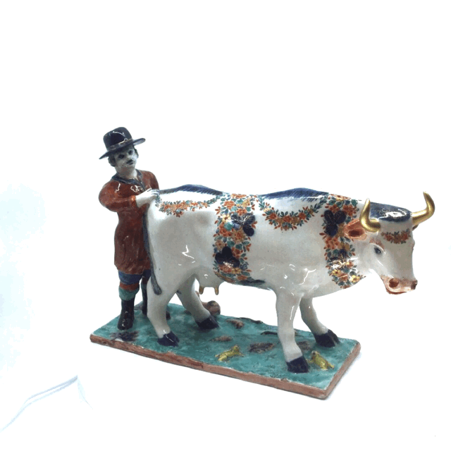 1924 Polychrome petit feu and gilded group of cow and cowherd