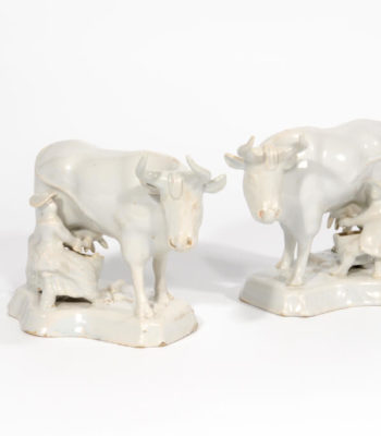 D2053. Pair Of White Delft Milking Groups