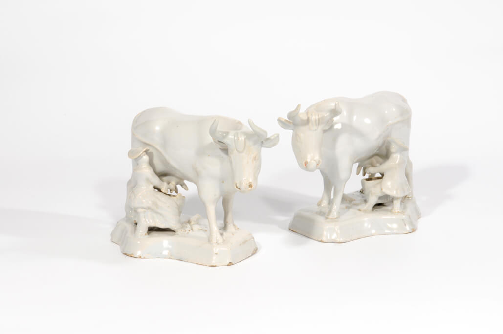 c59 white milking group Delftware cows