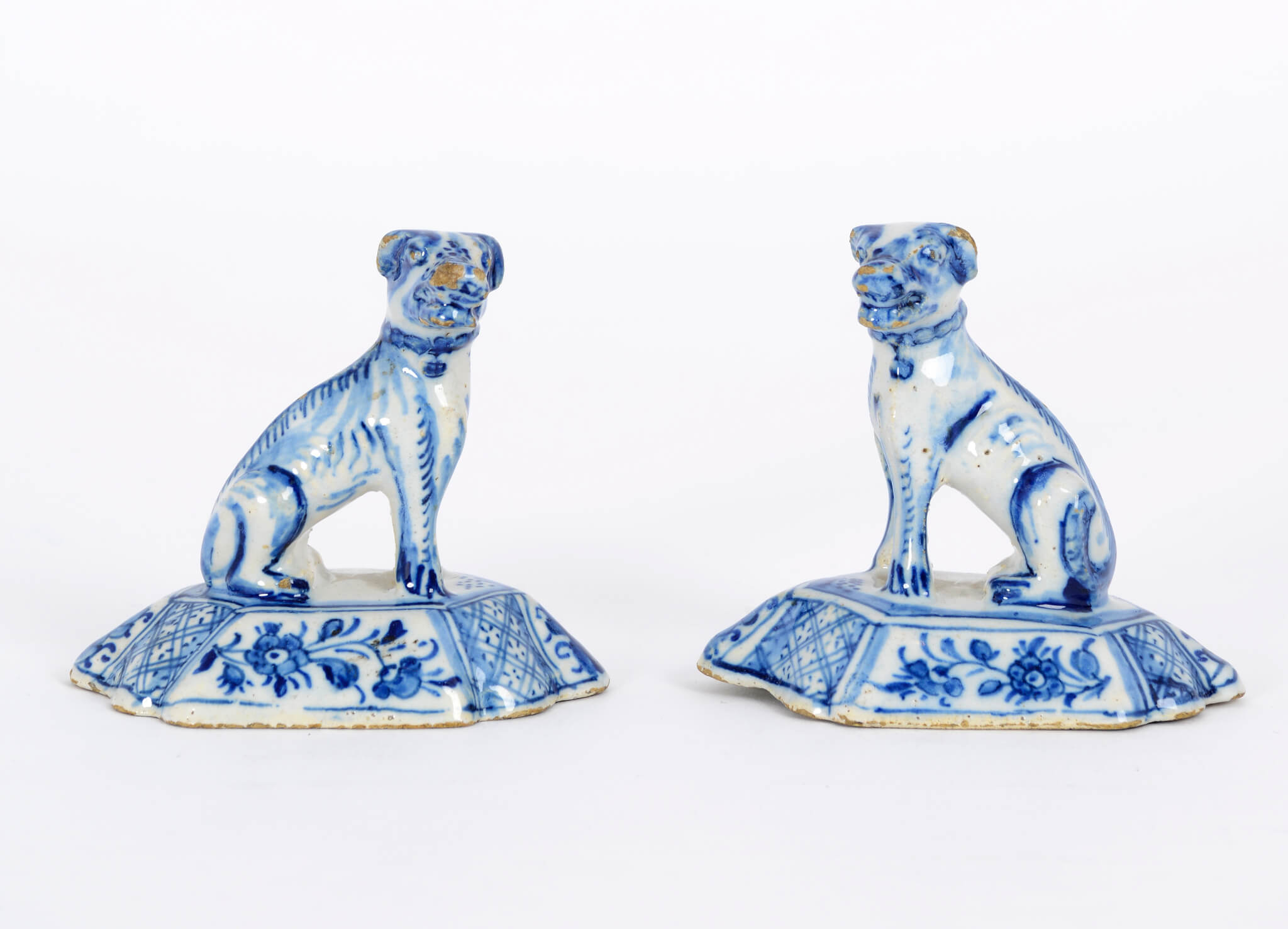 D1965. Pair of Blue and White Figures of Seated Dogs