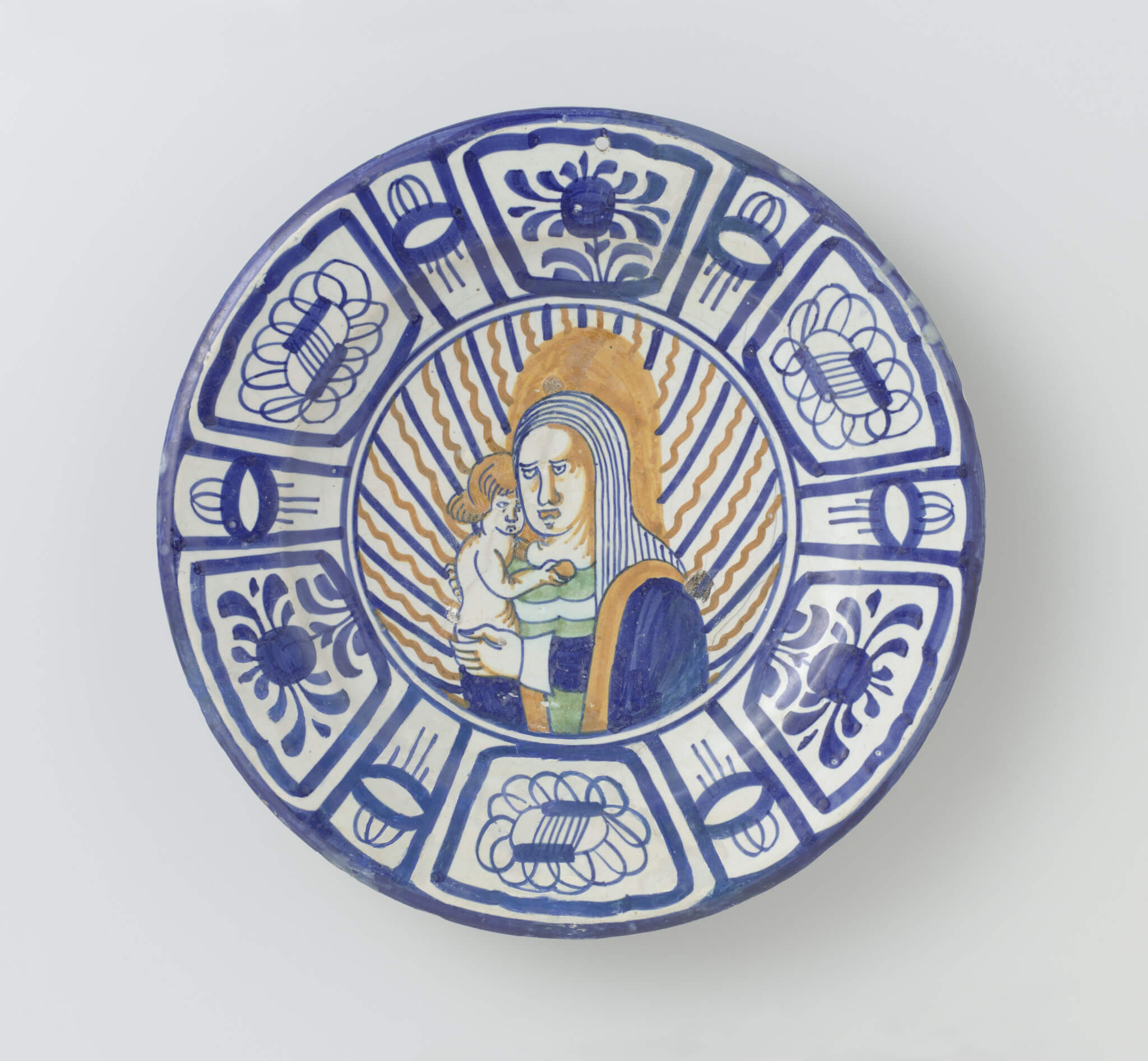 Majolica charger. Blue and orange. The Netherlands. 1625-1645