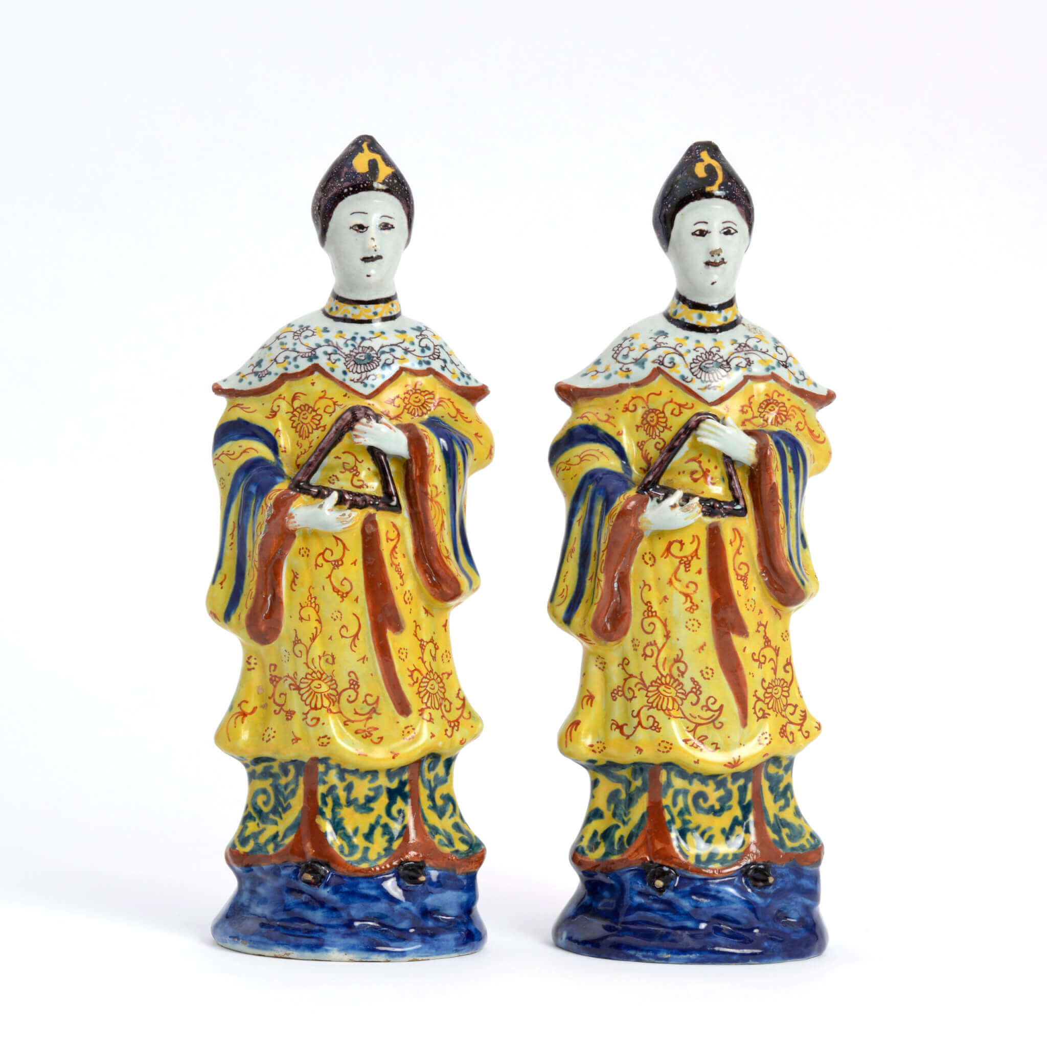 Polychrome Delftware figures of oriental women