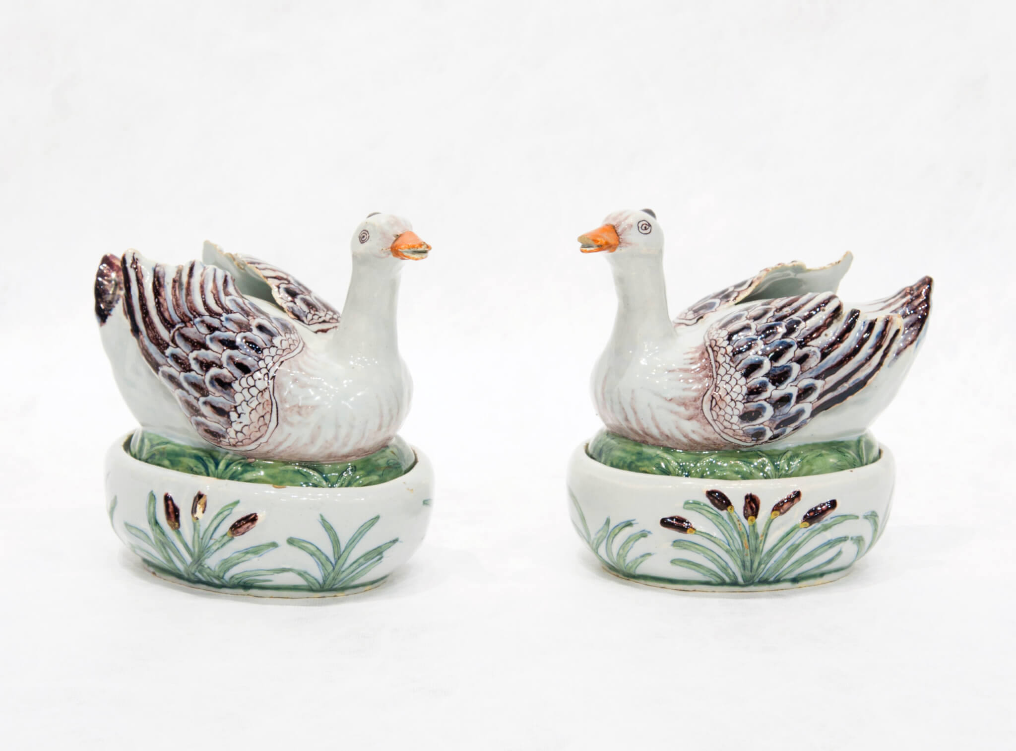 Pair of oval Delftware duck tureens and covers