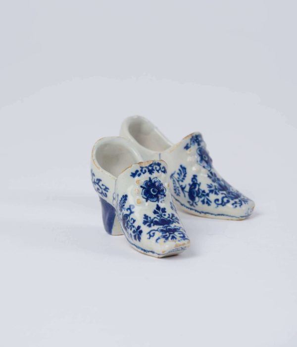 Blue and white models of shoes