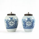 •D2058. Pair Of Blue And White Tobacco Jars With Brass Covers