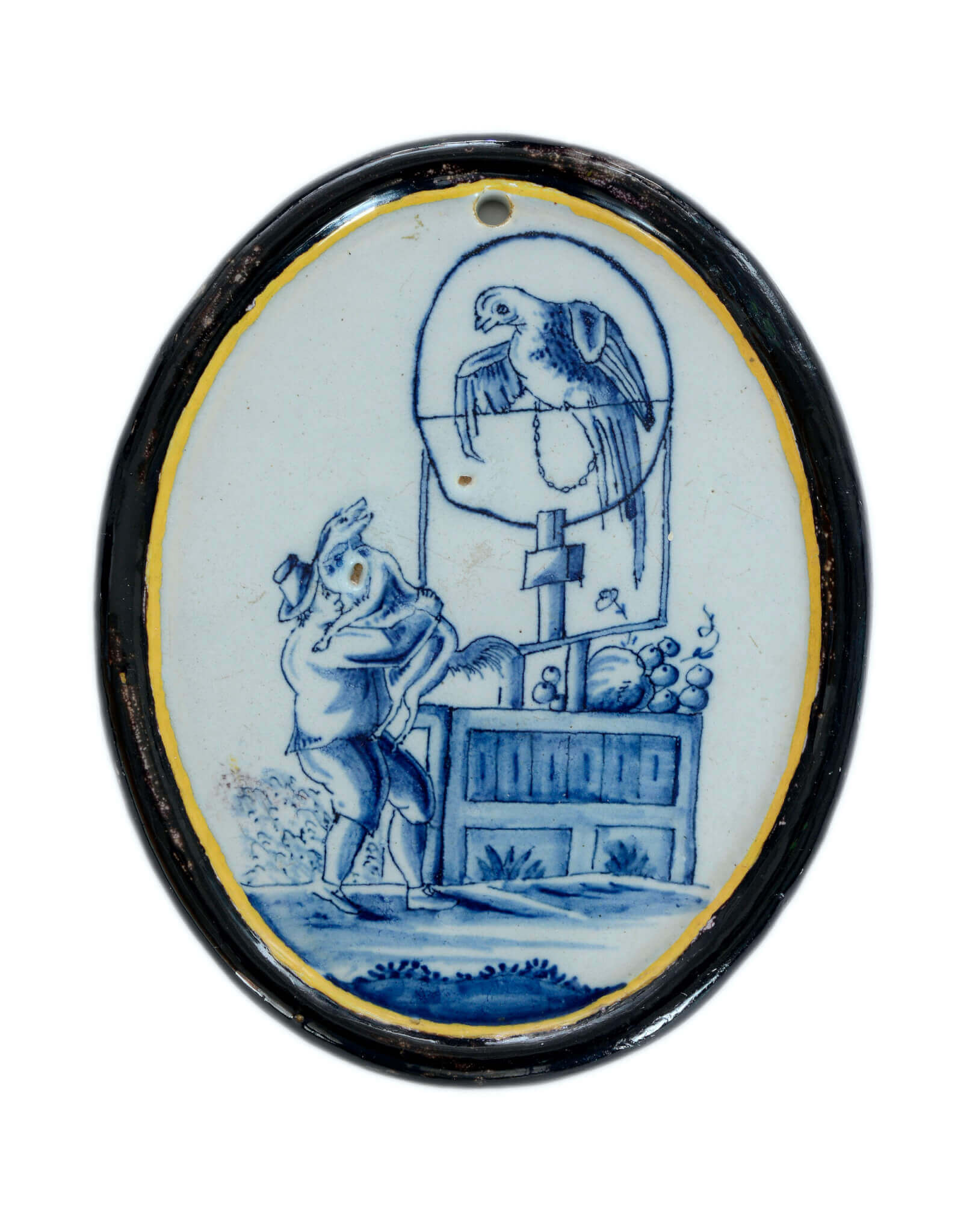 Delftware plaque with bird Delftware plaque with bird