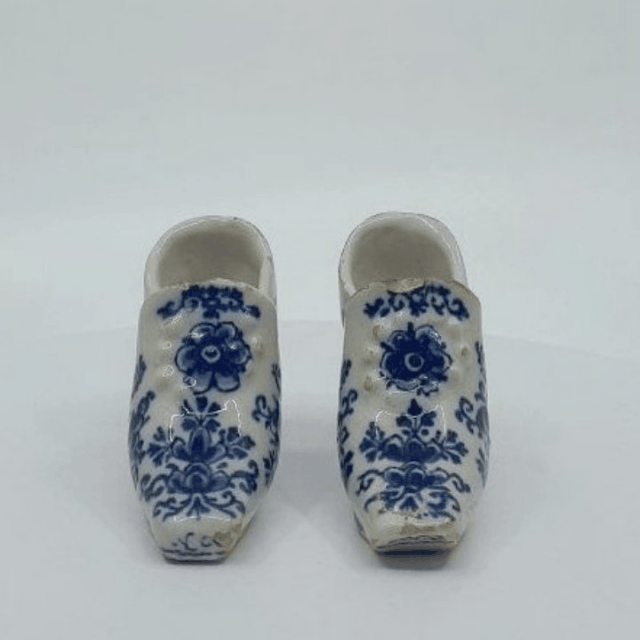 Blue and white models of shoes
