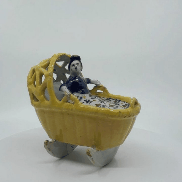 Polychrome Delftware model of a cradle 3D