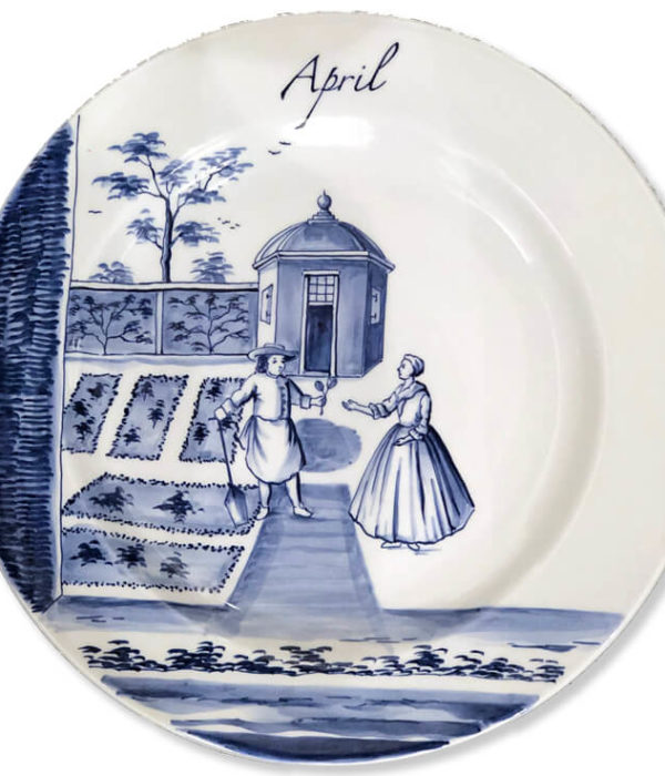 Blue and white modern Delftware plate with gardener supporting a spade and offering a posy to a lady