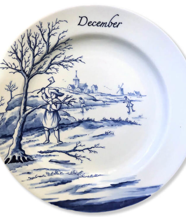 Blue and white modern Delftware plate man cutting a branch