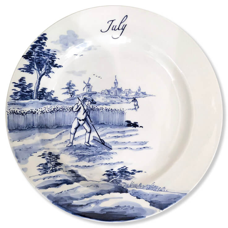 Modern Blue and white Delftware plate with a harvester raking hay while another drinks from a bottle