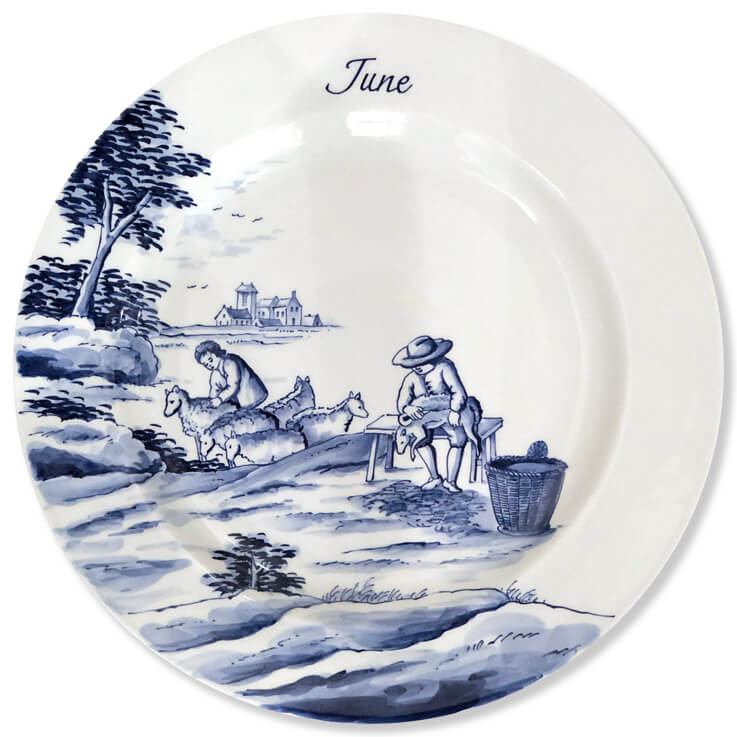 Blue And White Modern Delftware Plate With A Man Shearing A Sheep Near A Youthful Shepherd And His Flock