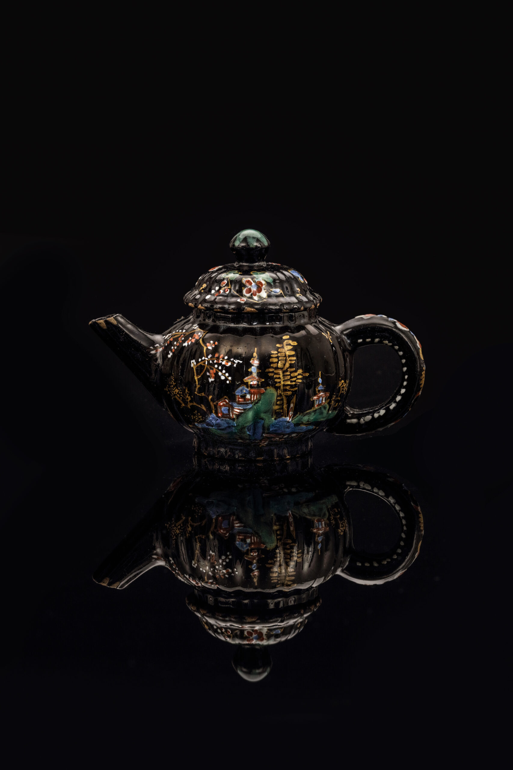 •D2390. Black Delftware Teapot and Cover