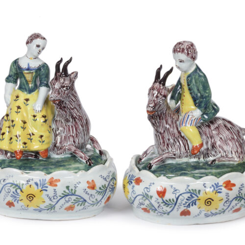 D2358. Pair Of Oval Butter Tubs And Covers With A Girl And Boy Seated On A Goat