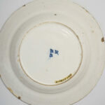 Marks Delft commemorative plate with General Chassé, marked for'De Drie Klokken' (the Three Bells) factory, in the Collection of the Dutch Open-Air Museum with inv. nr. NOM.51584-81