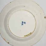 Marks Delft commemorative plate with General Chassé, marked for 'De Drie Klokken' (the Three Bells) factory, in the Collection of the Dutch Open-Air Museum with inv. nr. NOM.51584-81